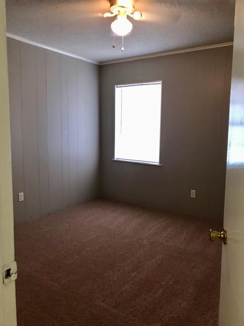 Apartment bedroom with carpet