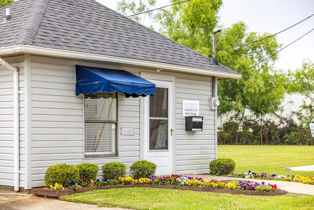 Parkwood leasing office with garden and entrance